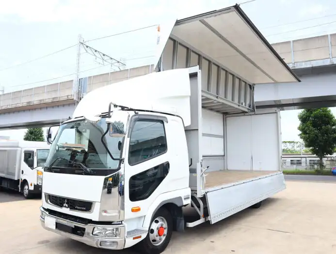 三菱 ファイター 中型/増トン ウイング ベッド 2KG-FK62F の中古トラック【車両No.130490】