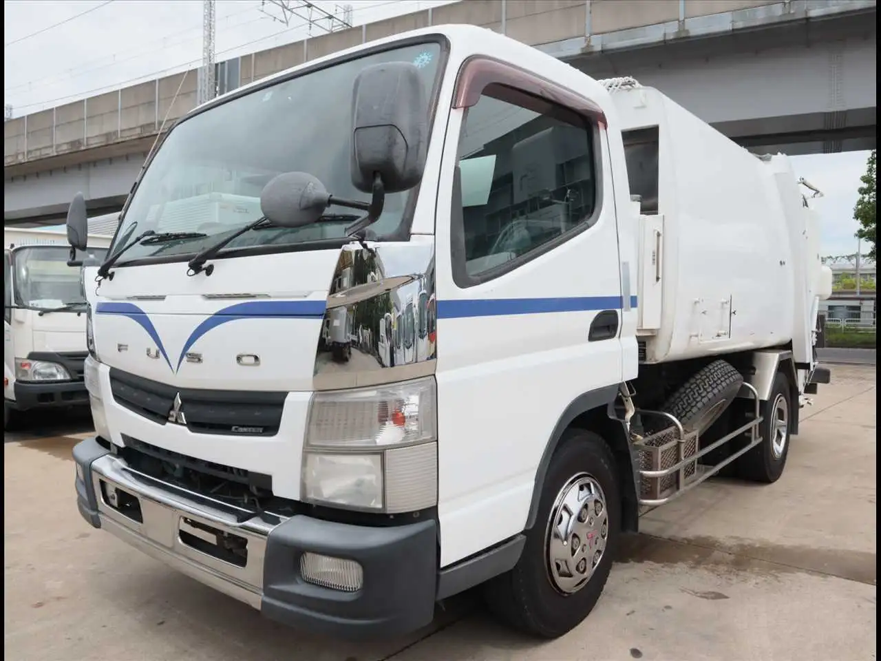 三菱 キャンター 小型 パッカー車 プレス式 TKG-FEB90 の中古トラック【車両No.166088】