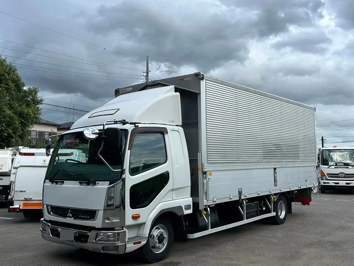 三菱 ファイター 中型/増トン ウイング ベッド TKG-FK61F の中古トラック【車両No.174063】